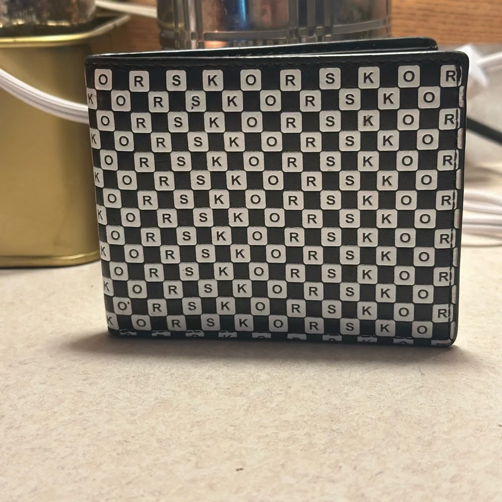 Michael Kors Cooper bilfold bifold wallet. Black and white. Used, mild wear